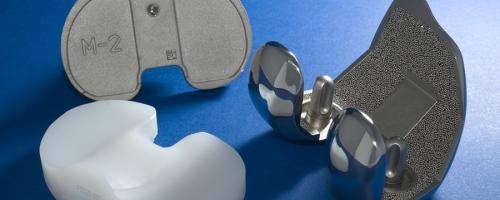 Orthopedic implants with laser engraving for medical traceability