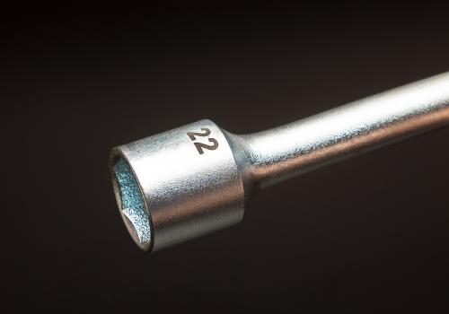 Metal ratchet socket wrench marked for identification