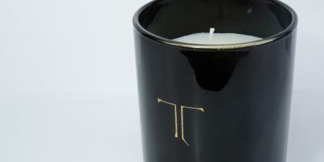 Black tinted glass engraved and filled with gold gilding wax